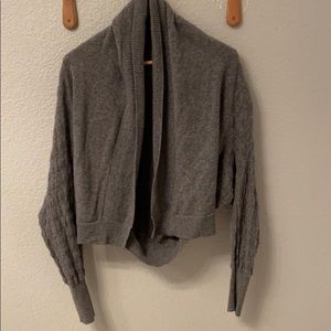 100% Cashmere cardigan with swooped back